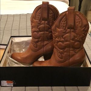 Women’s Boots, brown in color.